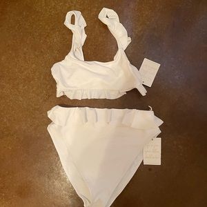 Show Me Your MuMu white swimsuit.